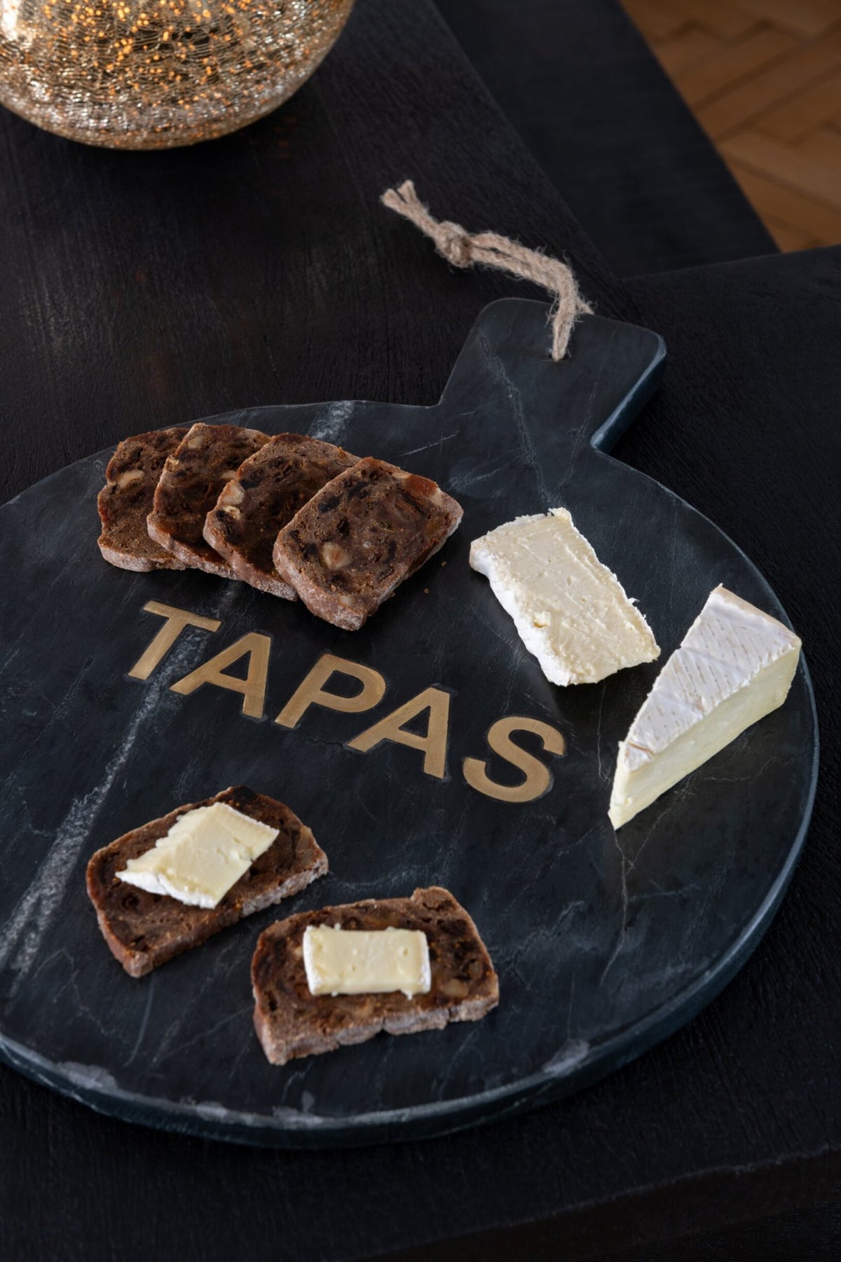 Kaasplank rond marmer zwart/goudkleurig